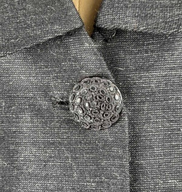 Soprabito taglio trapezio